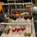 Misc Dangle Earrings - Convention Center